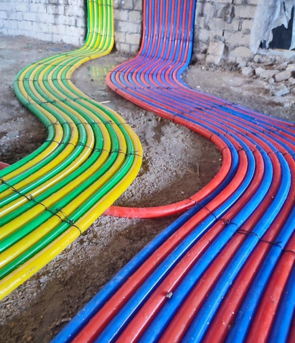 Colour-coded conduit running side by side